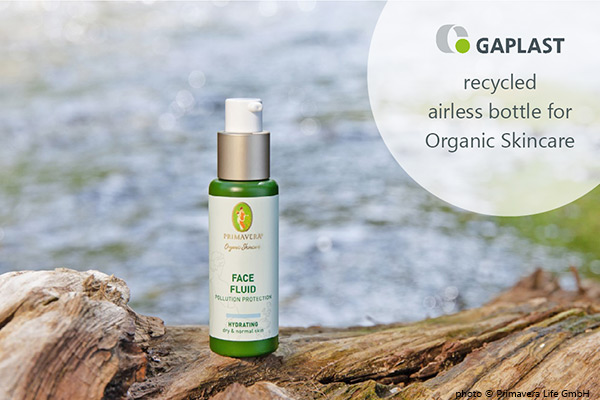 product shot in nature of Primavera face fluid with AirlessMotion PCR bottle